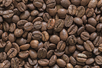 Brown coffee beans texture. Nice  background for designers project.