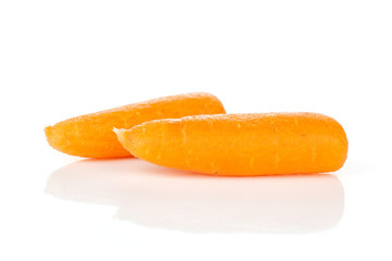 Group of two whole fresh peeled orange baby cut carrot isolated on white background