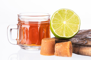 Hot sugarcane-water (aguapanela) with lemon. Text space