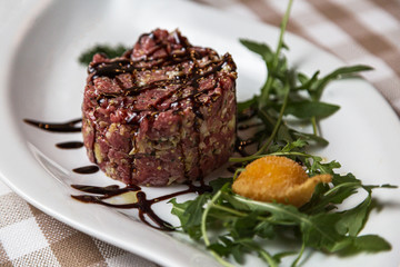 Beef tartare a summer appetizer to serve cold