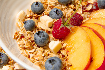 Delicious breakfast. Sweet vegan granola with plant milk and fruits