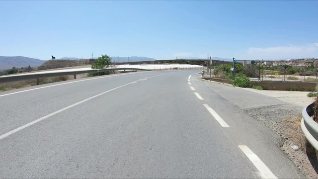paved road Viator-Rioja next to Rioja, Province of Almeria, Andalusia, Spain