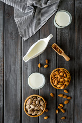 almond for cooking milk on wooden background top view
