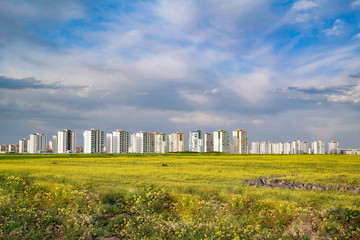 Fototapeta na wymiar newly built high-rise apartment buildings in city land in turkey