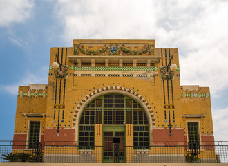 Exterior of an old building in Liberty architecture style with colorful decoration and stained...