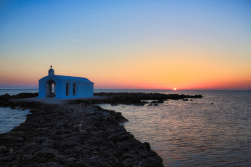 Fototapeta na wymiar greek church at sunset