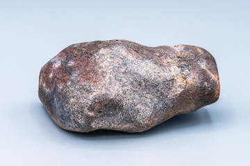 Chondrite Meteorite L Type isolated, piece of rock formed in outer space in the early stages of Solar System as asteroids. This meteorite comes from a meteorite fall impacting Earth at Atacama Desert