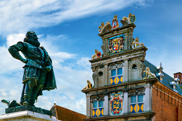 Rode Steen square with ancient Town hall and statue of Jan Pieterszoon Coen