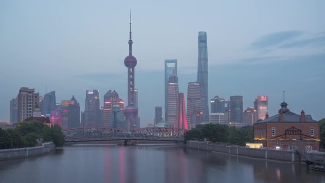 time lapse of sunset, Shanghai skyline and Waibaidu bridge, China