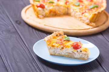 Chicken Quiche lorraine with mushrooms , tomatoes and cheese