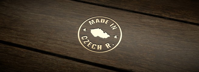 Stamp made in Czech Republic, engraved in wood with gold inlays.
