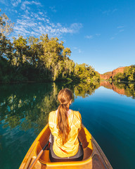 woman kayaking up river in Australia - 279723431