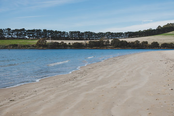 sunny Australian beach in Cremorne, Tasmania