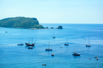 boats sailing in blue sea