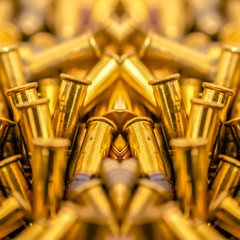 Pile of bullets on an axis of symmetry