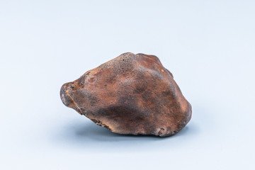 Chondrite Meteorite L Type isolated, piece of rock formed in outer space in the early stages of Solar System as asteroids. This meteorite comes from a meteorite fall impacting Earth at Atacama Desert © abriendomundo