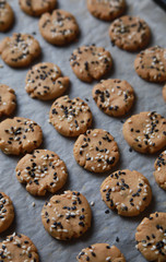 Sesame cookies on baking tray