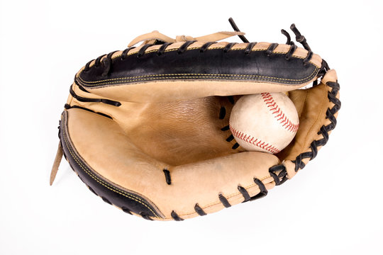 Close up of baseball catcher's mitt isolated on white background