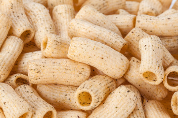 Top view of pile of Rod Snack tube, Crispy cracker snack background.