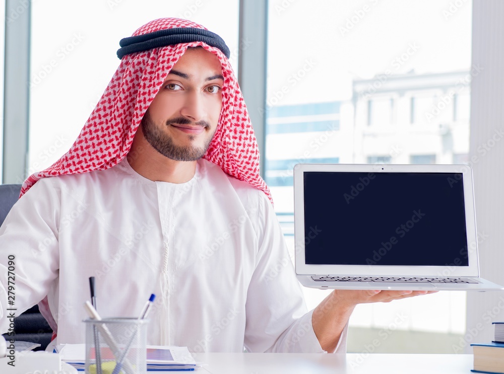 Wall mural Arab businessman working in the office - Wall murals