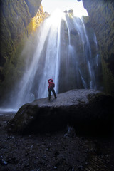 Beautiful scenery of Gljufrafoss is a waterfall that behind a cliff in Iceland. This waterfall is very popular for photographers and tourists.