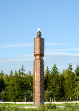 Religion of the Northern peoples of Yakutia - Serge with symbols and a flower at the top at the entrance to the Park in the village of ulus Suntar.