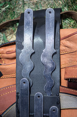 Set of five throwing knifes in leather sheath