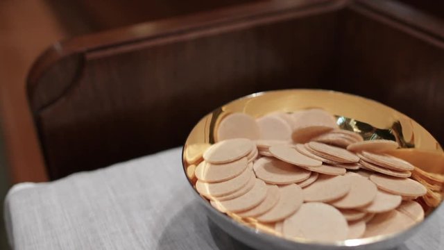 Religious eucharist bowl in church slow close