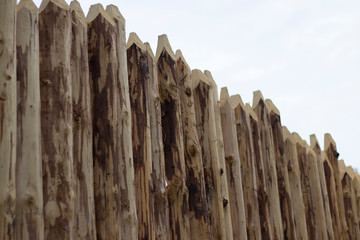 log fence, new, unpainted, natural wood