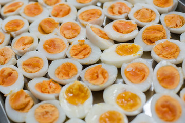 Peeled boiled egg ,Medium-boiled egg.Many eggs cooked to boil cooked to put together as food.