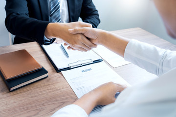 Job applicant business, career and placement businessperson shaking hand with candidate after successful negotiations or interview at the working place.