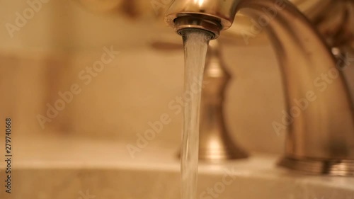 Slow Motion Water Coming Out Of Bathroom Faucet Stock Footage