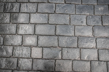 Grey cobblestone pavement after the rain in the Czech Republic