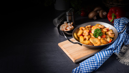 a delicious fried potato and shrimp pan