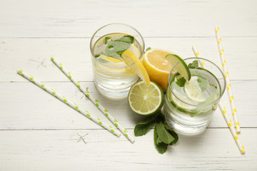 Fresh detox lemon water, healthy drink. Summer citrus lemonade.