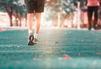 run jogging exercise for health lose weight concept on track rubber public park. Vintage tone
