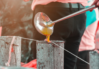 candle casting Buddhist religion tradition. select focus with shallow depth of field