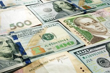 Ukrainian Currency exchange dollars and hryvnia cash.