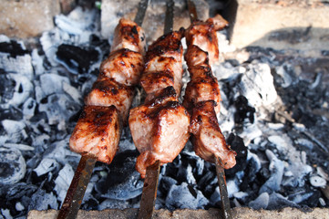 Tasty, but very harmful fried meat on coals.