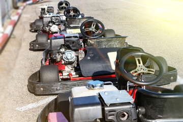 A number of small race cars ready for the race.