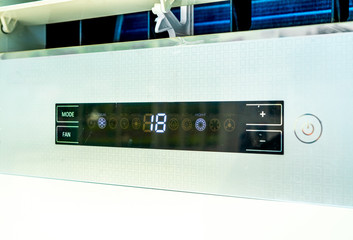 Digital Temprature Control Panel of Air Conditioner with 18 Degree Celsius and Mode Fan Sign