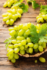 Sweet yellow grape with leaves