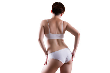 Slim sexy woman in white underwear isolated on white background, perfect female body