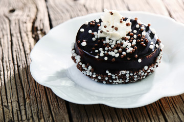 chocolate pastry sweet cake on a white plate. Homemade bakery, festive dessert