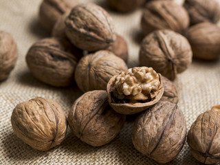 Group of nuts on brown background