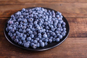 Blueberry antioxidant organic superfood in a bowl concept for healthy eating and nutrition