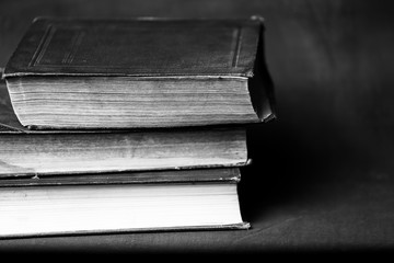 old books are on the table in the studio