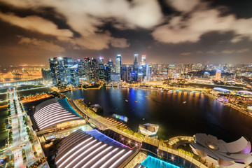 Fototapeta na wymiar Fabulous night aerial view of Marina Bay in Singapore
