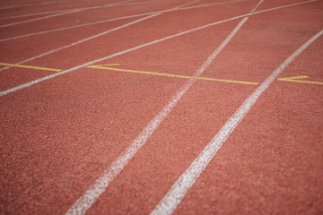 Sport. A red treadmill or athletics track at the stadium. Copy space