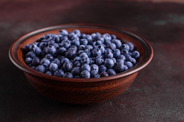 Blueberry antioxidant organic superfood in a bowl concept for healthy eating and nutrition